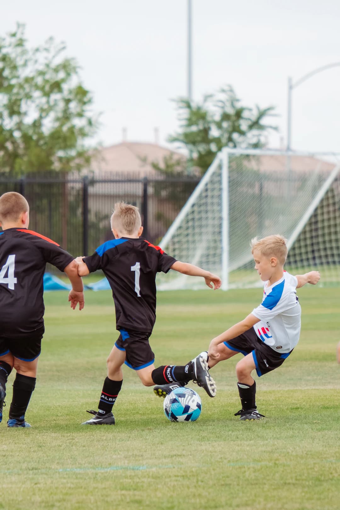 Kids playing youth soccer